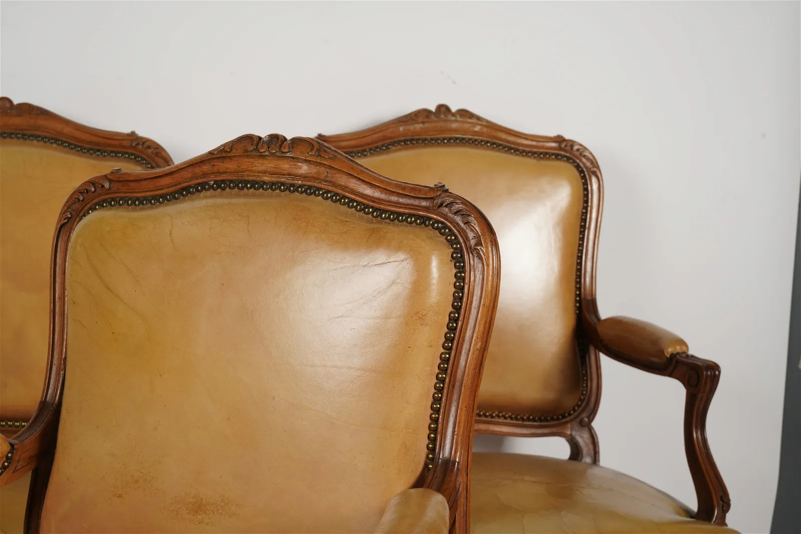 AF2-036: Pair of Late 20th Century French Provincial Fruitwood Fauteuils w/ Leather Upholstery