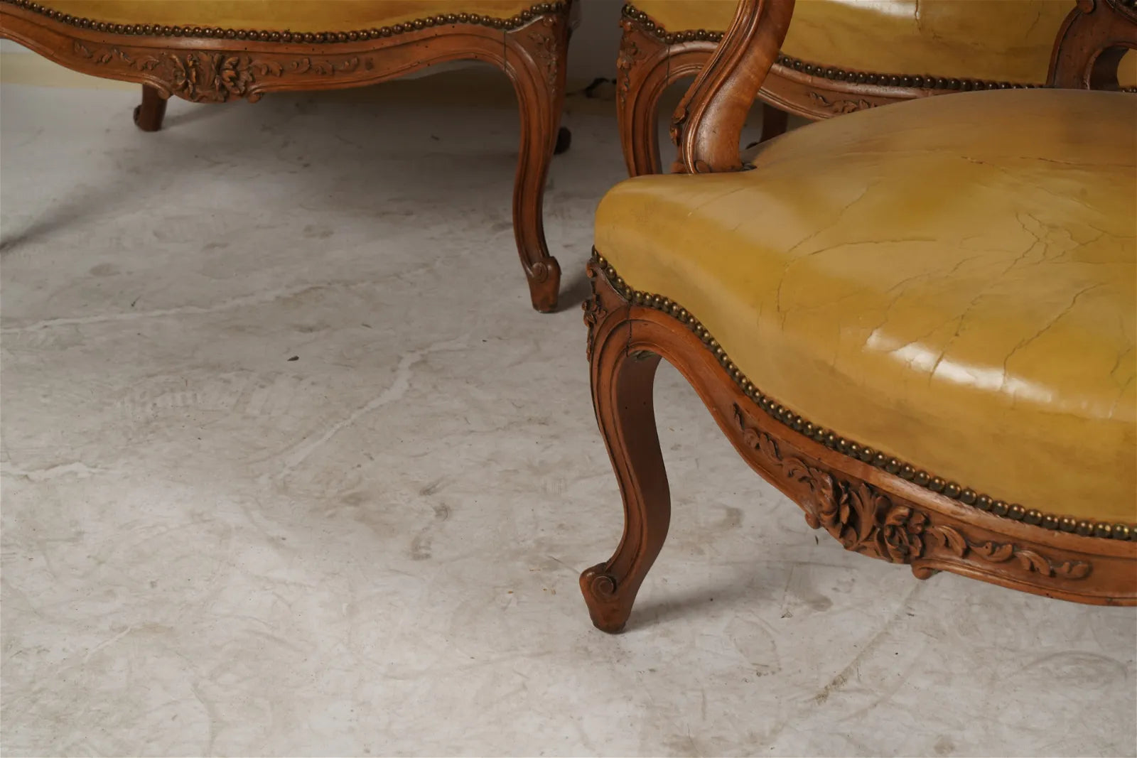 AF2-036: Pair of Late 20th Century French Provincial Fruitwood Fauteuils w/ Leather Upholstery