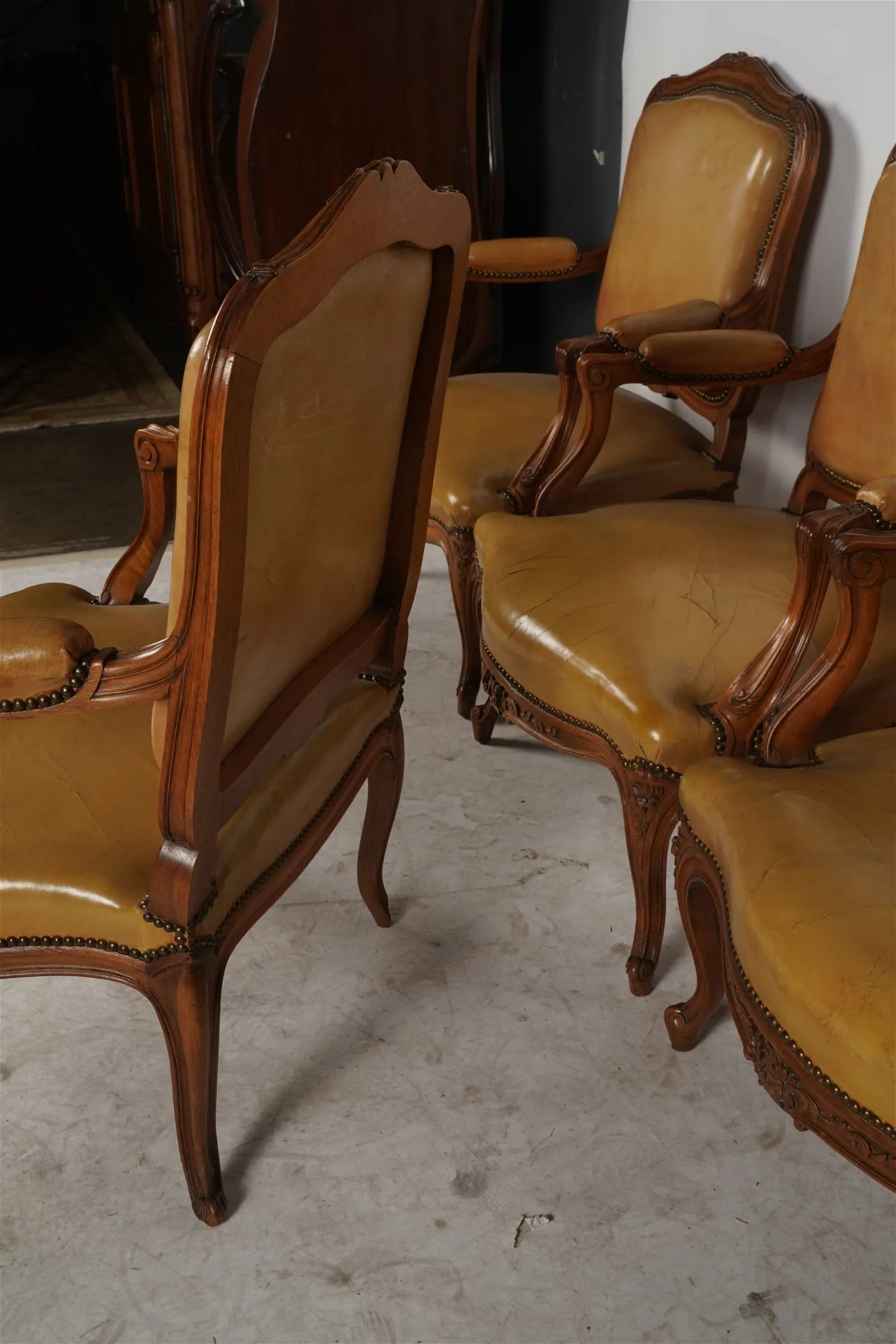 AF2-037: Pair of Late 20th Century French Provincial Fruitwood Fauteuils w/ Leather Upholstery