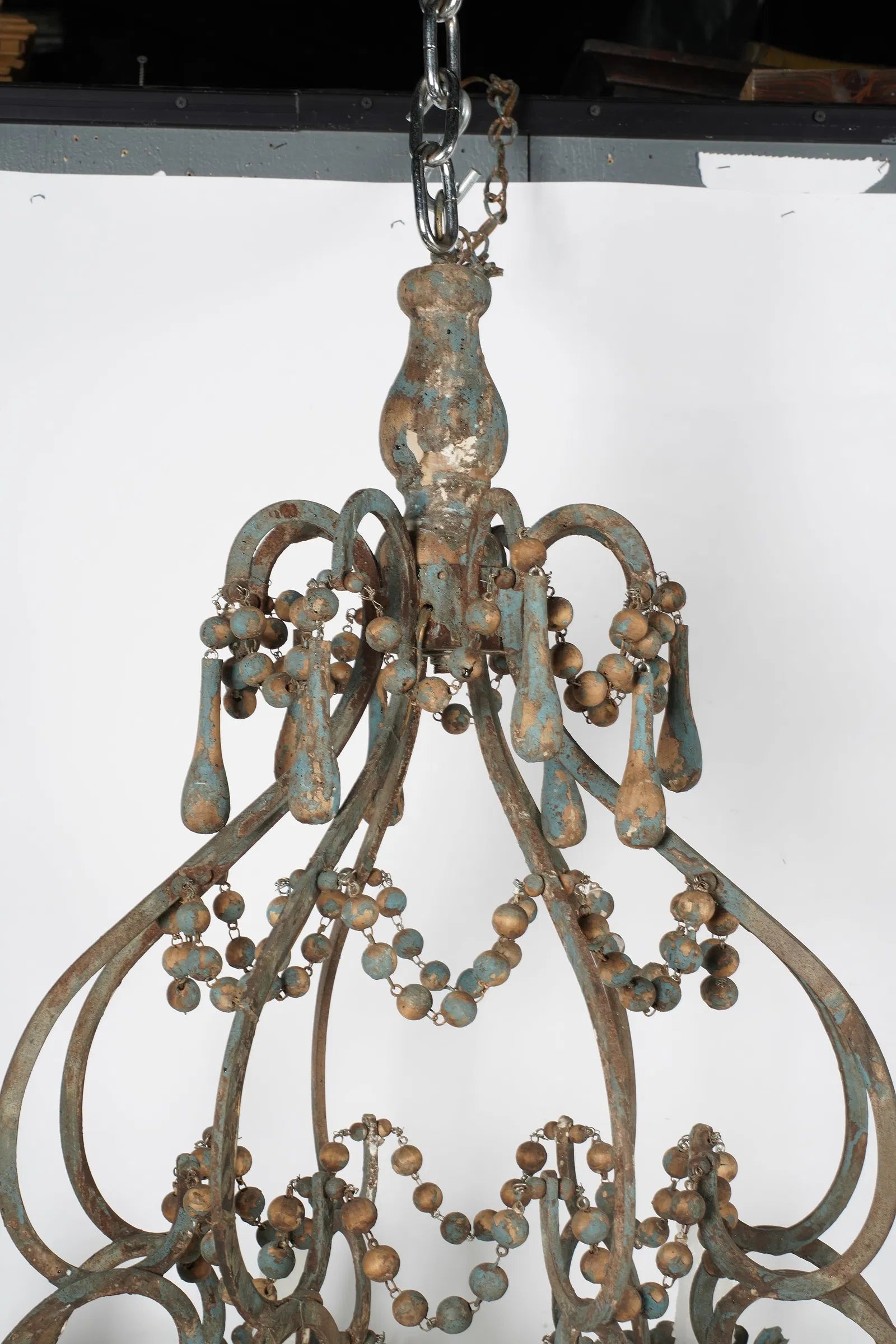 AL1-018: Antique Distressed Painted Iron Chandelier With Wooden Beads and Drops Mid 20th Century