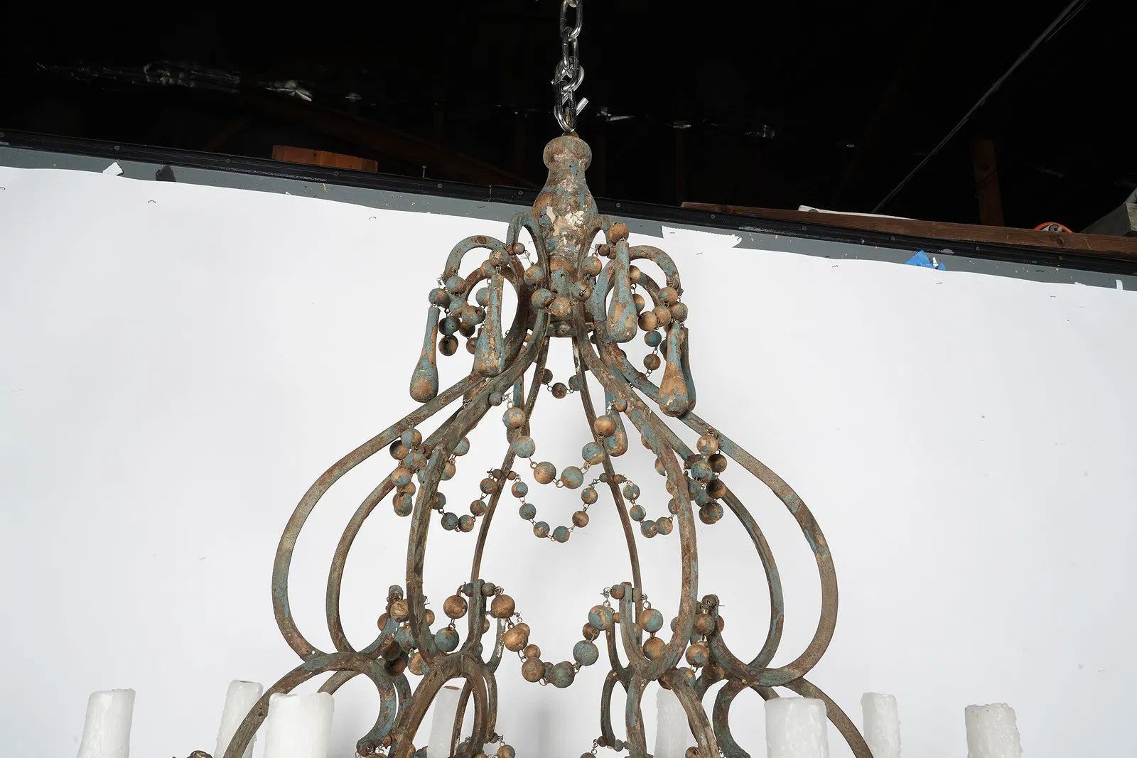 AL1-018: Antique Distressed Painted Iron Chandelier With Wooden Beads and Drops Mid 20th Century