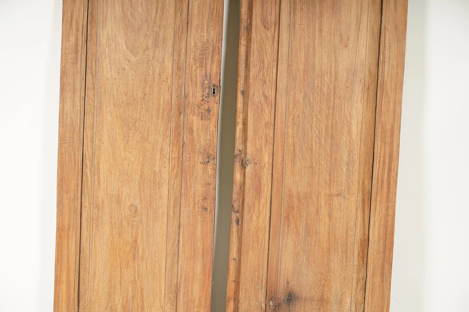 AA7-040: Pair of Rustic Walnut Paneled Doors With Iron Hinges