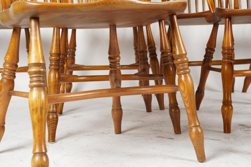 AF2-105: Antique Set of 8 Early 20th Century Oak Bow Back and Sack Back Windsor Chairs