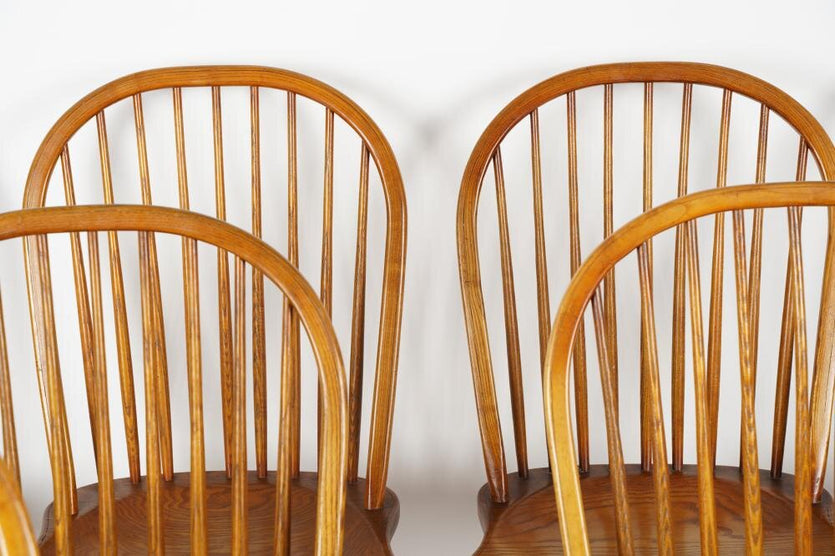 AF2-105: Antique Set of 8 Early 20th Century Oak Bow Back and Sack Back Windsor Chairs
