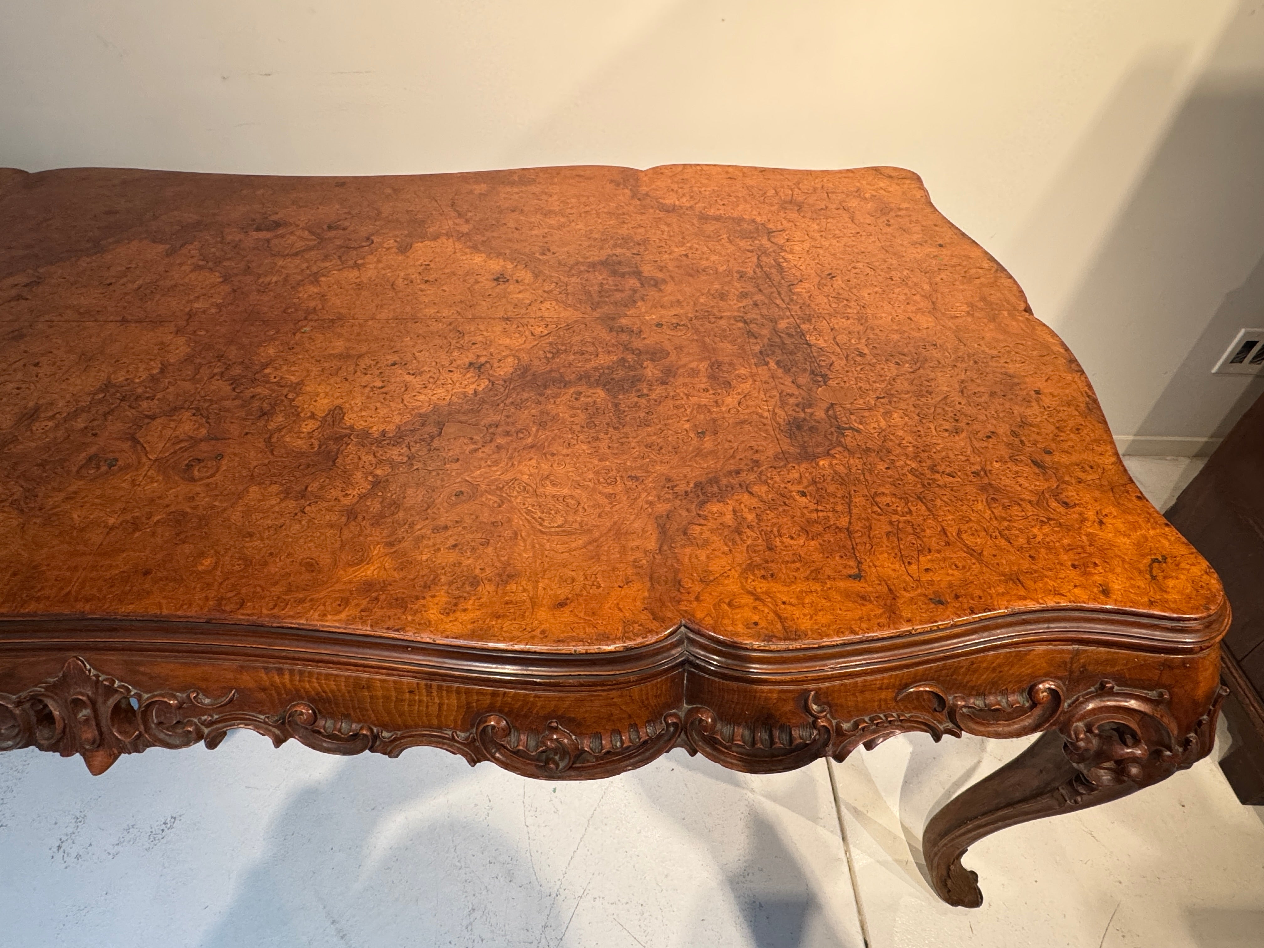 AF1-065: Antique French Louis XV Style Beechwood and Burl Walnut Highly Carved Dining Table Late 19th Century