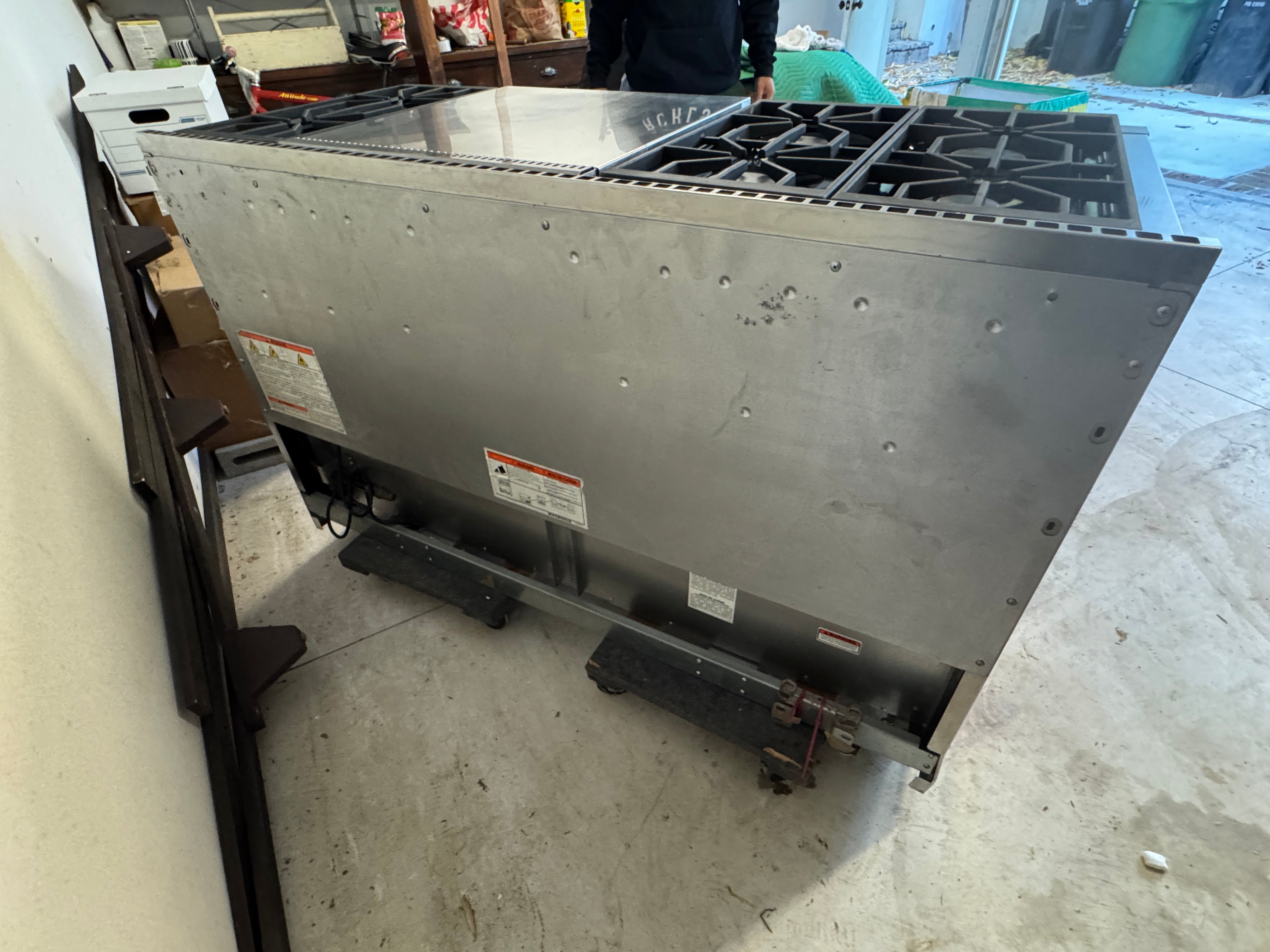 CR13-001: Wolf 60" Gas Range Model # GR606F With French Top Never Used