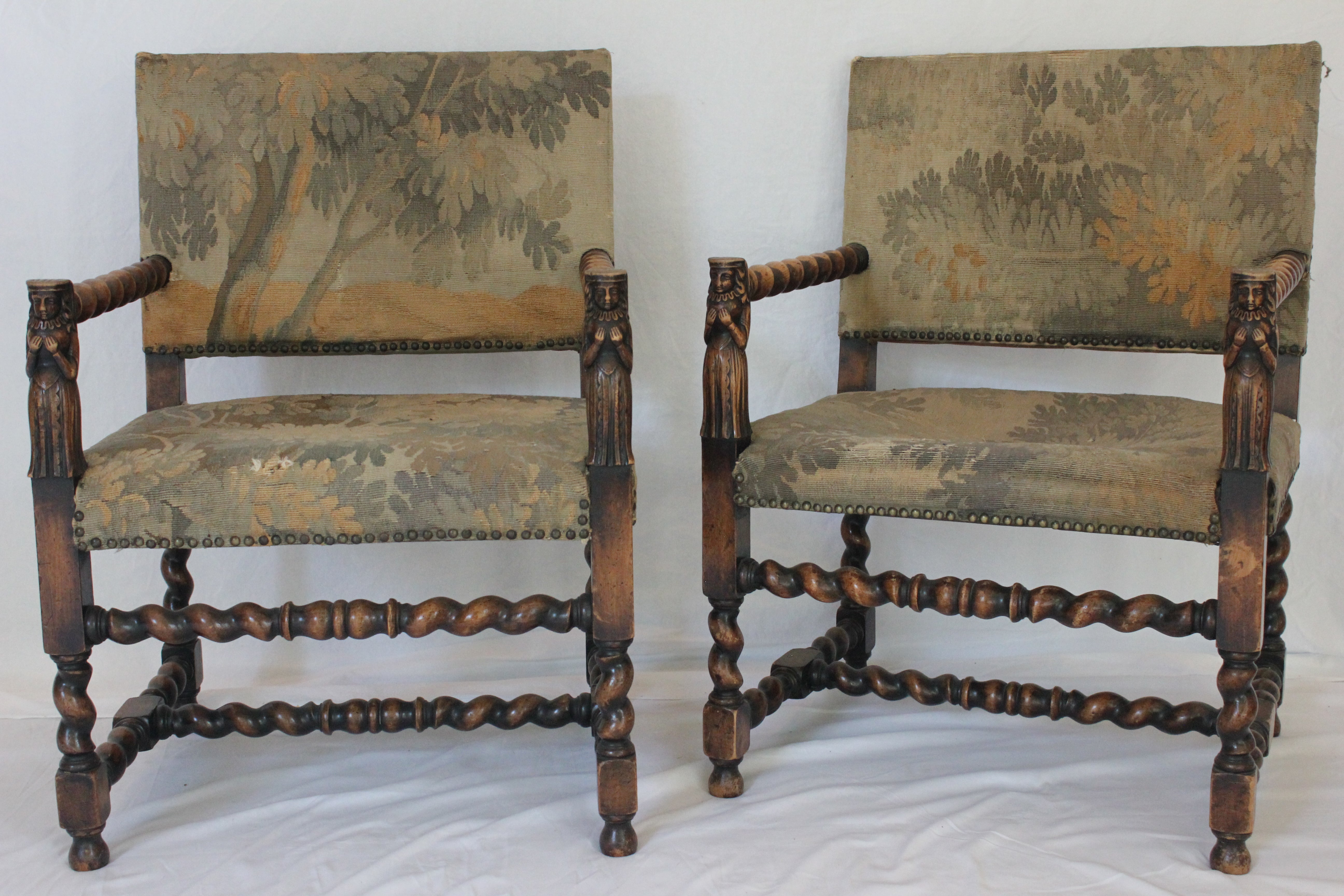 AF2-374: Antique Pair of Early 19th Century Louis XII Style Carved Walnut Arm Chairs w/ Tapestry Remnant Upholstery