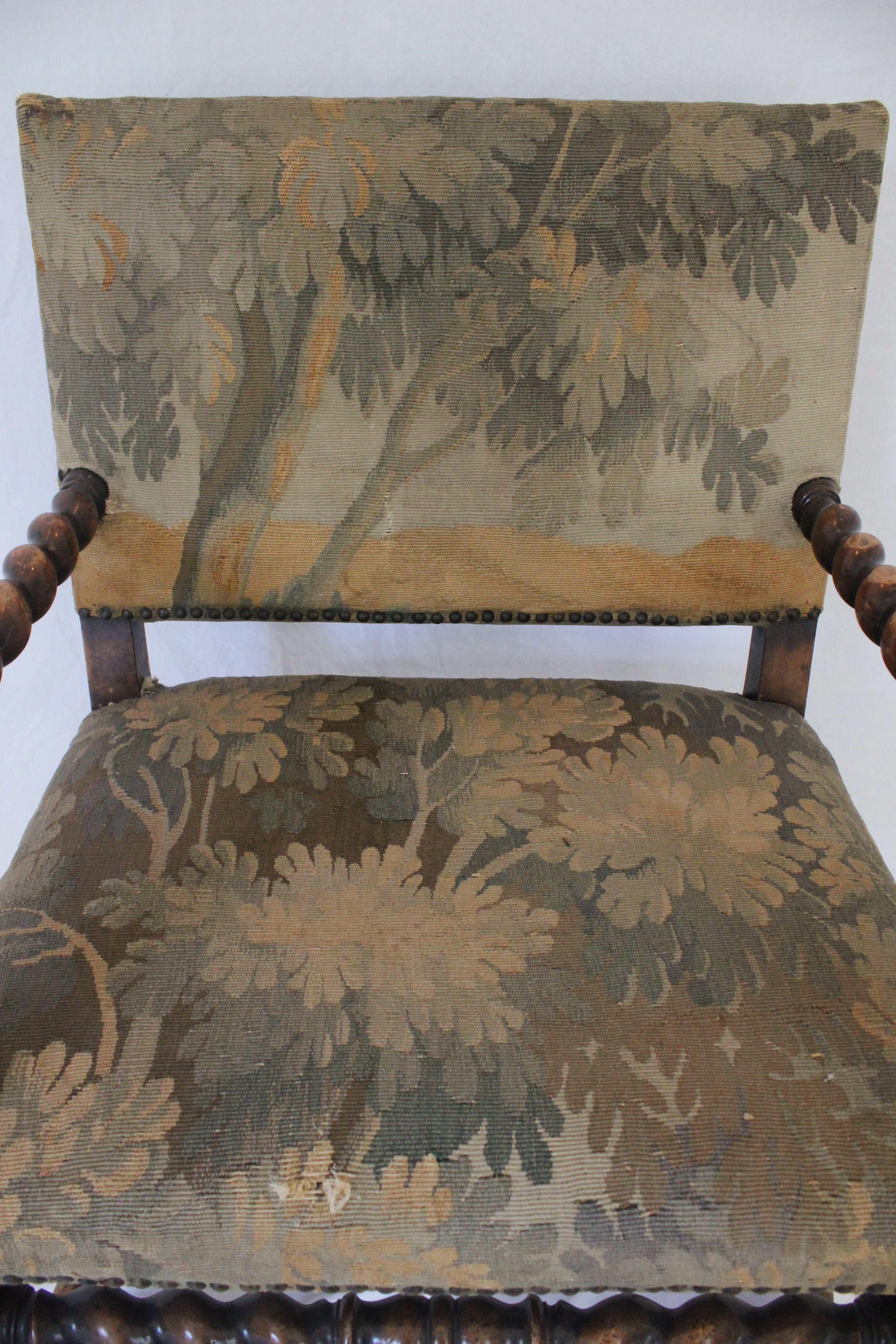 AF2-374: Antique Pair of Early 19th Century Louis XII Style Carved Walnut Arm Chairs w/ Tapestry Remnant Upholstery
