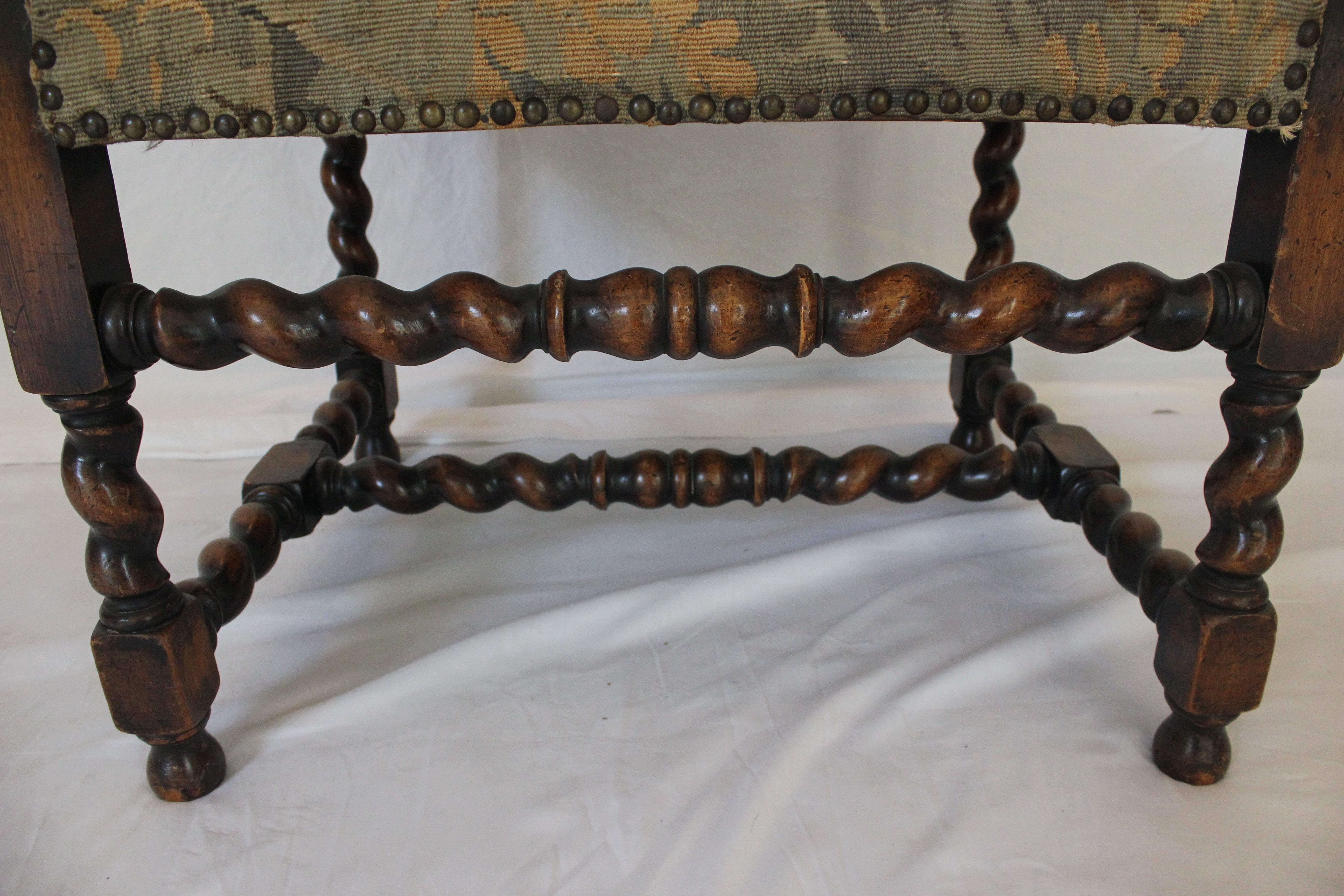 AF2-374: Antique Pair of Early 19th Century Louis XII Style Carved Walnut Arm Chairs w/ Tapestry Remnant Upholstery