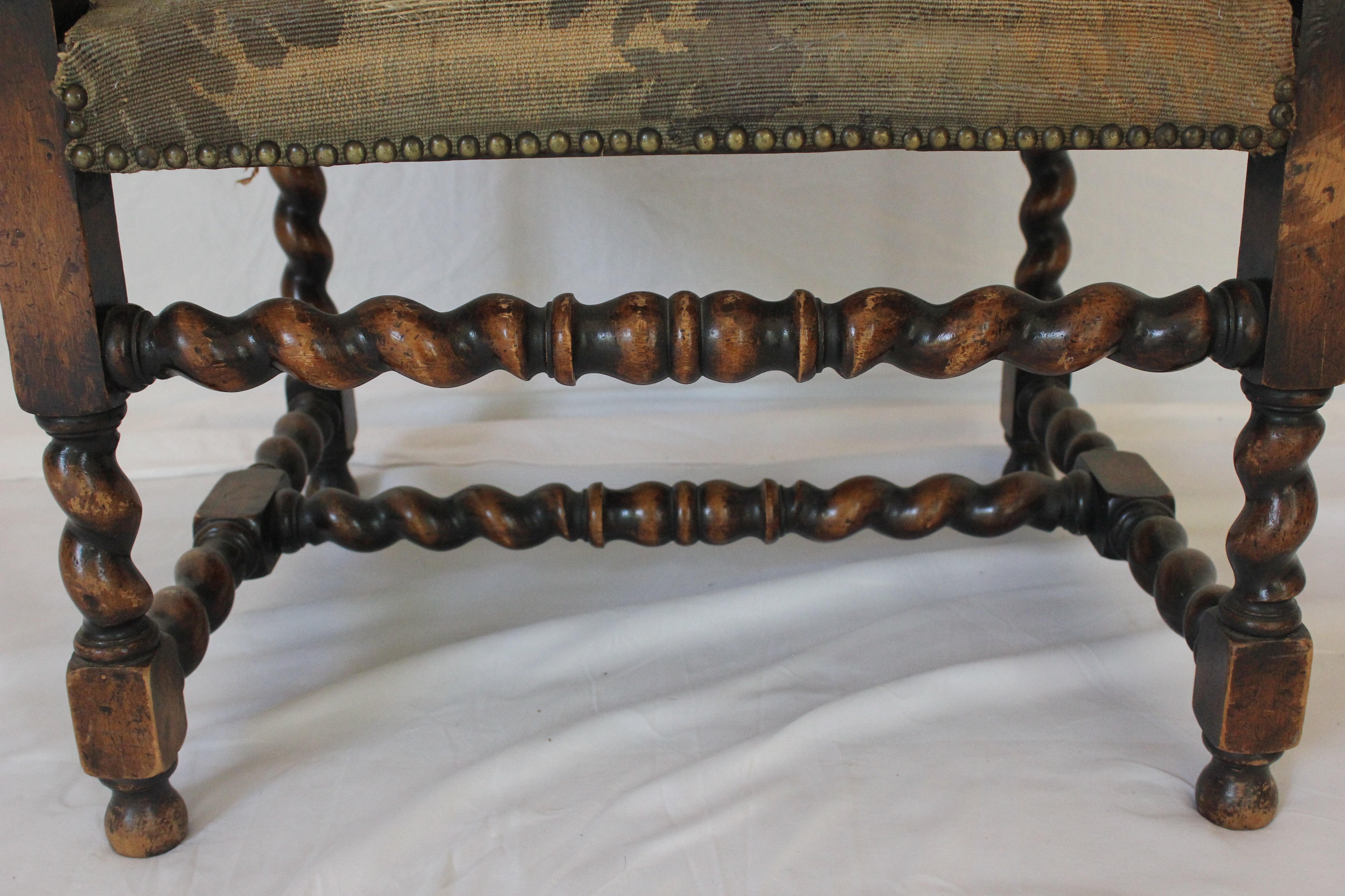 AF2-374: Antique Pair of Early 19th Century Louis XII Style Carved Walnut Arm Chairs w/ Tapestry Remnant Upholstery