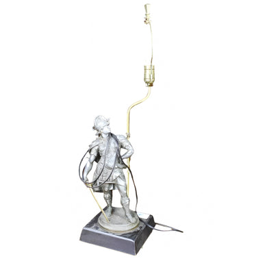 Antique Patinated metal lamp depicting a Roman soldier | Work of Man