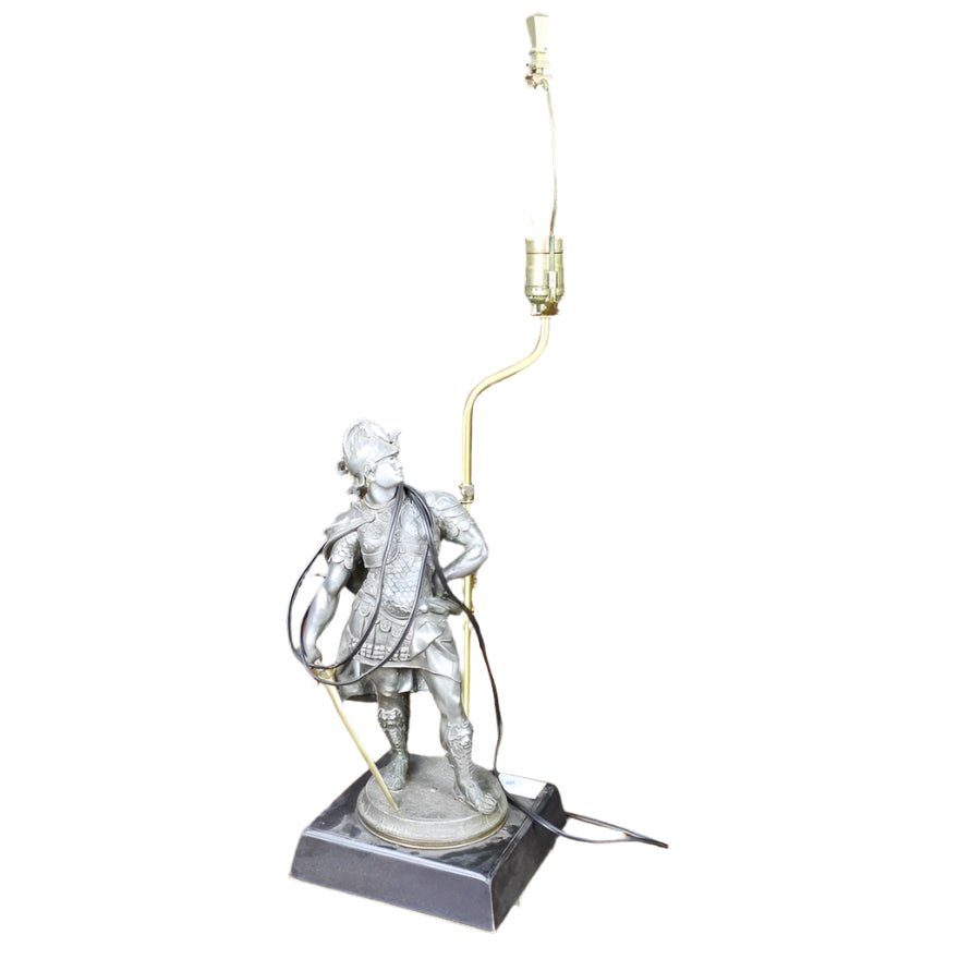 Antique Patinated metal lamp depicting a Roman soldier | Work of Man